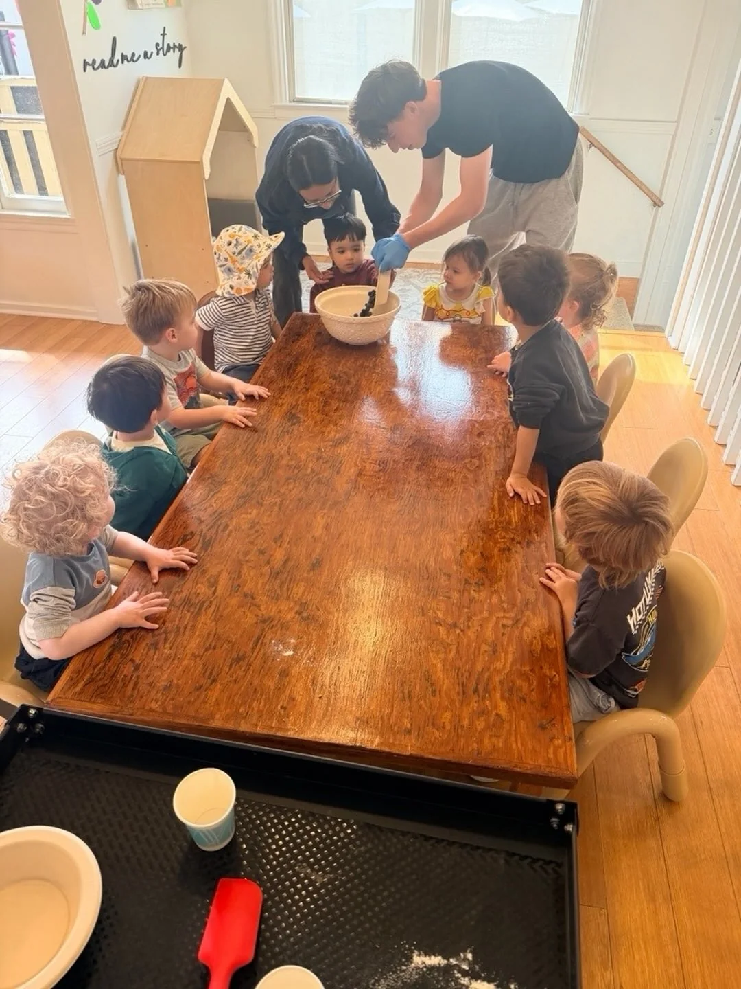 UMC Preschool children gathered for a hands-on classroom activity
